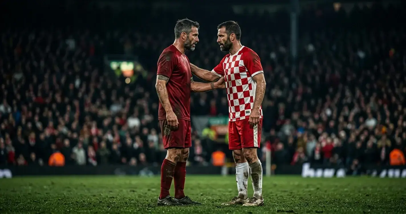 Due veterani del calcio si fronteggiano a centrocampo in uno stadio illuminato di notte